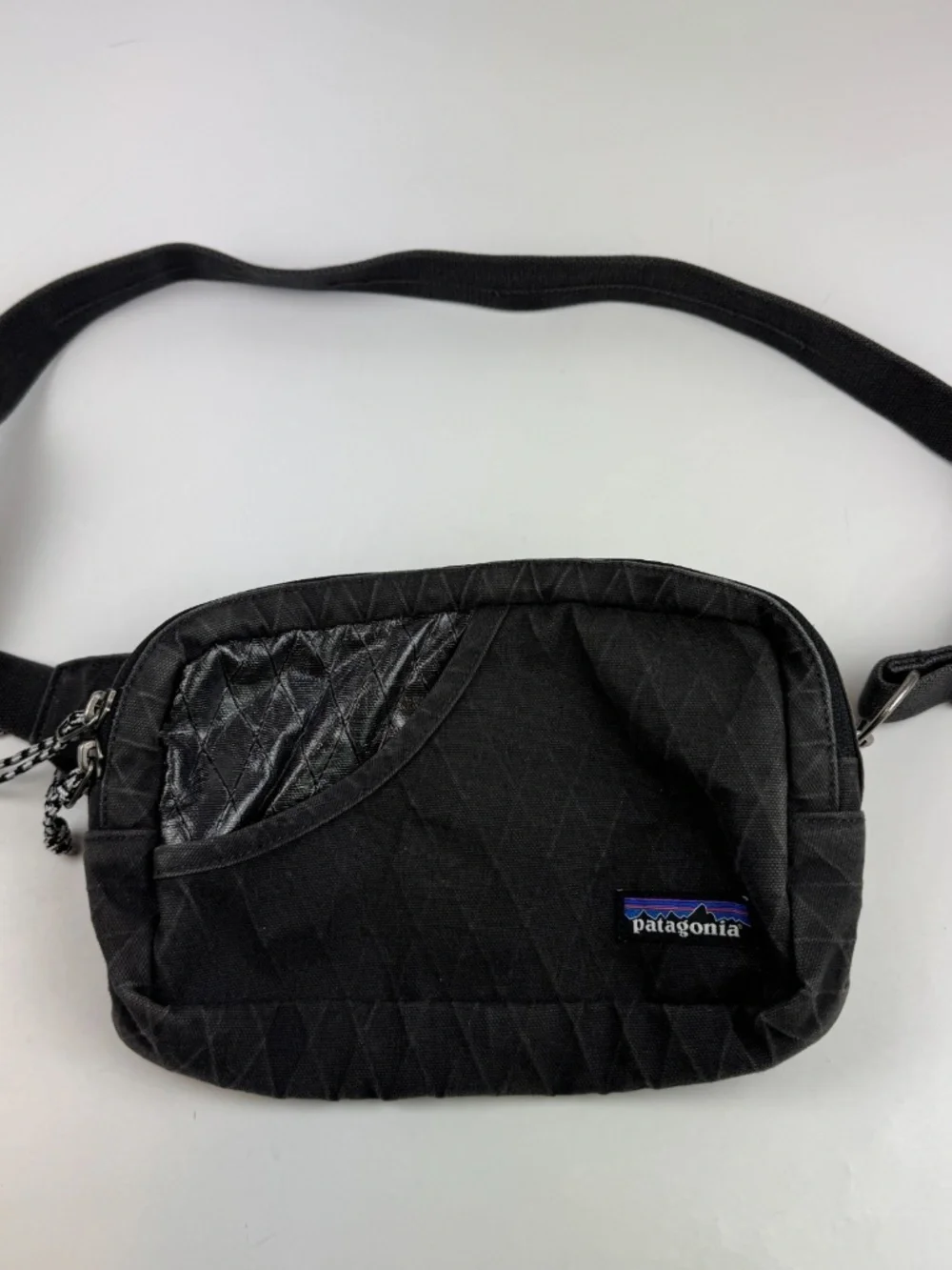patagonia black belt bag Hole Waist Pack 5L - CNY is visible on the front of the bag Patagonia Black Hole Waist Pack